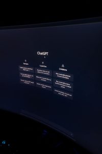 Minimalist close-up of ChatGPT interface displayed on a dark monitor screen, highlighting AI technology.